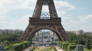 A photo of the Eiffel Tower in Paris with the Olympic logo