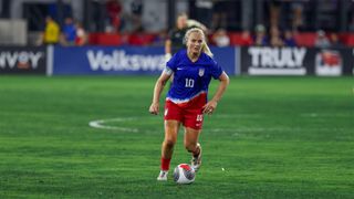 USWNT captain Lindsey Horan runs with the ball during a July 2024 friendly against Costa Rica.