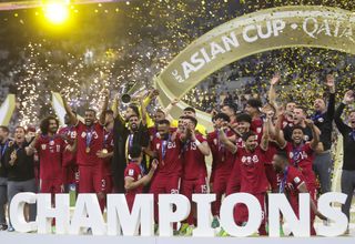 Qatar players celebrate after winning the AFC Asian Cup in 2023.