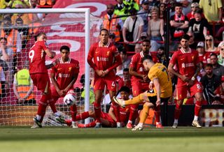 Darwin Nunez, Jarell Quansah, Virgil van Dijk, Wataru Endo, Ryan Gravenberch and Dominik Szoboszlai of Liverpool during the Premier League match between Liverpool FC and Wolverhampton Wanderers at Anfield on May 19, 2024 in Liverpool, England. (Photo by Andrew Powell/Liverpool FC via Getty Images)